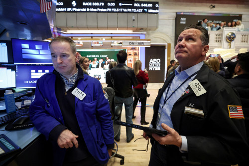 Wall St ticks higher as investors await economic data