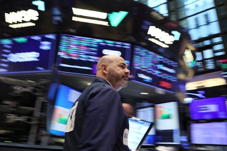Wall Street ends sharply higher, powered by earnings momentum; Fed eyed
