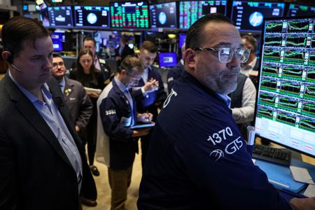 US stocks end lower ahead of Powell, jobs data; bitcoin surges